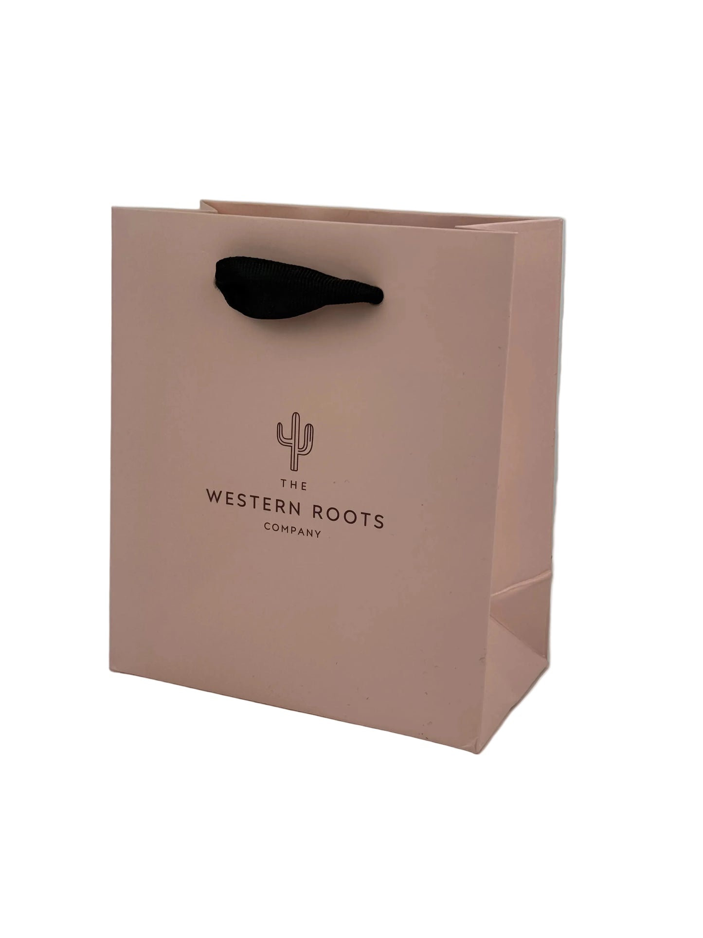 Pink packaging with a black item and 'The Western Roots Company' logo on a white background